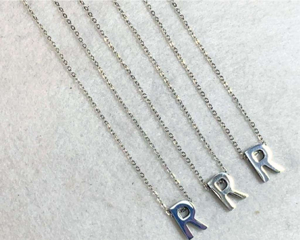 SILVER STAINLESS STEEL NECKLACE LETTER R – Set of 12